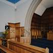 Interior.
View of Chancel from W showing the pulpit and reused panelling.