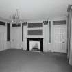 Interior. Ground floor View of the Central Saloon from NNW showing 18th century paneling, giant corinthian pilasters and early 19th century fireplace
