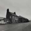 View from NNE showing House No.2 and warehouse beyond.