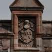 Detail of armorial panel above doorway.