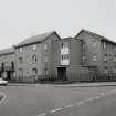 Corner block linking Castle Street and Lower Craigo Street, view from NW.