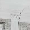 Interior. Detail of pilaster corinthian capital and cornice