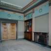 Interior. Library View from SW showing fireplace and fitted bookcases