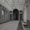 Interior. Conservatory View from W showing columned entrance, floor grilles and planters