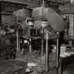 1st floor: Detail of clicking press, made by the Northampton Machinery Co Ltd