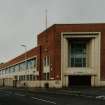 View of main entrance to W block of works, on corner of Arbroath Road (left) and Morgan Street.