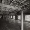 Interior view from S on top floor of extension (built 1948) showing concrete construction