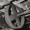 1st floor: Detail of wooden pulley on overhead lineshaft