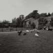 General view of wall and buildings from E