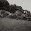 General view of walled garden cottage from SW