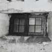 Exchange Street building. Interior.
Detail of typical window on Second floor of West half of block. Wooden framed, each half contains four panes. (Opening/casement is 1.4m wide by 0.82 high). The windows are all barred.