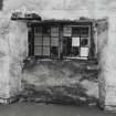 Exchange Street building. Interior.
Detail of standard window in East half of block on second floor. Wodden framed, each half contains nine panes. (Window opening is 1.3m wide by 0.75m high).
