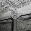 Exchange Street Building. Interior.
Detail of column head on ground floor at West end of block, with lath and plaster ceiling, columns are 0.16m dia, are at 3.3m centres, and have saddles for beams 330mm deep by 250mm wide.
