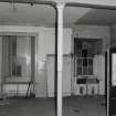 Dock Street Building. Interior.
General view of first floor area, with typical cast-iron column, 0.14m dia, c.3.3m high, and at about 3.5m centres.
