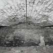 Exchange Street Building. Interior.
View of West half of basement from North-East with three bays of brick vaulting. Round cast-iron columns are 0.18m dia and 1.85m high at 3.3m centres, cast-iron beams bottom flange is 0.2m wide. Depth of arch is 0.38m. Flagstone floor.