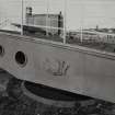 Detail showing cast-iron 'Dundee Harbour' crest on footbridge