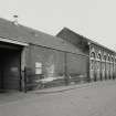 Dundee, Bower Mill: View of main entrance and weaving shed frontage onto Douglas Street from SW