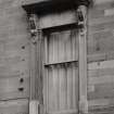 Detail of specimen window on facade.