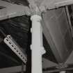 Detail of cast-iron column (0.18m diameter at base) in Weaving Room, with socket to hold bracket supporting overhead line shaft bearing.