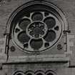 Detail of rose window of South frontage.
