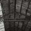 Interior.
Detail of ornate cast iron roof truss in carding and drawing machine room.