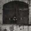 View of arched doorway in South side of raw jute warehouse.
