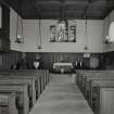 Interior.  From W towards communion table and pulpit