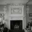 Interior. SE wing. Ground floor parlour. Detail of fireplace