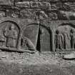 Slab depicting Abraham and Isaac (left) and Adam and Eve (right) placed within W end of mortuary enclosure in burial-ground.