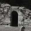 Exterior view of doorway at W end of S wall.