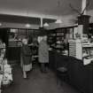 Interior view of 1 Dunira Street, Comrie, showing the shop of Brough and Macpherson from S.