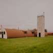 View from  NE of Officers ablutions/showers, multi gym block (hut 22) and water tower