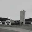 View from NW of laundrette/ bunk store (hut 17) and water tower