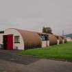 View from SE of of NAAFI (hut 65) and row of huts (68-71) to rear