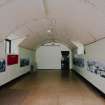 Interior view of lecture room with demonstration scenic dsiplays on the walls