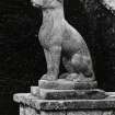Detail of statue of dog at foot of stone stair (no.3 on plan), from East.