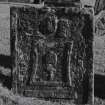 Dunning, St. Serf's Parish Church, Graveyard.
General view of West face of tombstone, 1744. Crown and hammer and winged soul.
Insc: 'Memento Mori'.