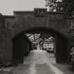 Fingask Castle, Stable block.
General view of North-West entrance arch.