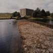 View along weir from ENE.