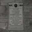 Interior. Detail of memorial at W end to D C Mirrielees of Garth d. 28th August 1944