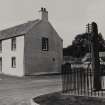 Fowlis Wester, The Old Inn.
General view of Inn, and Pictish cross slab.