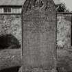 General view of grave 155, commemorating John Oswald, 1909. Arched stone with crown and cross, and foliate decoration.