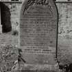 General view of grave 158, commemorating William Erskine, 1896. Arched stone with design of columbine, roses and lillies.