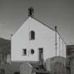 View from W showing gable and bellcote