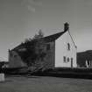 View from NW showing church on raised terrace