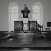 Interior. Axial  view from N of the pulpit and communion table