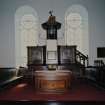 Interior. Axial  view from N of the pulpit and communion table