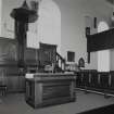 Interior. View from NE showing the pulpit and communion table