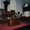 Interior. View from NE showing the pulpit and communion table