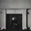 Logie House, interior.
Detail of fireplace in the West wing basement apartment.